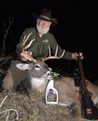 Larry Weishuhn shows off a fine buck he took on the hunt. Photo by Luke Clayton