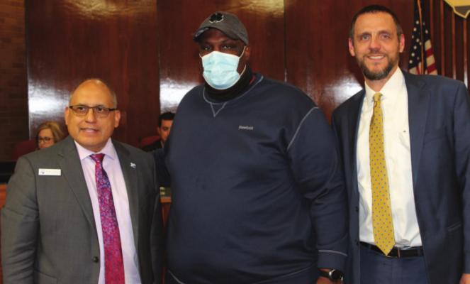 Mayor Rick Carmona, left, M. Legend Brown, center, and City Manager Mike Sims at Tuesday’s council meeting. HANK MURPHY PHOTO