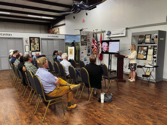 Dr. Sara Collini speaks at a Declaration of Independence program at the No. 1 British Flyning and Training School in Terrell in late March. Photo courtesy of No. 1 BFTS Museum