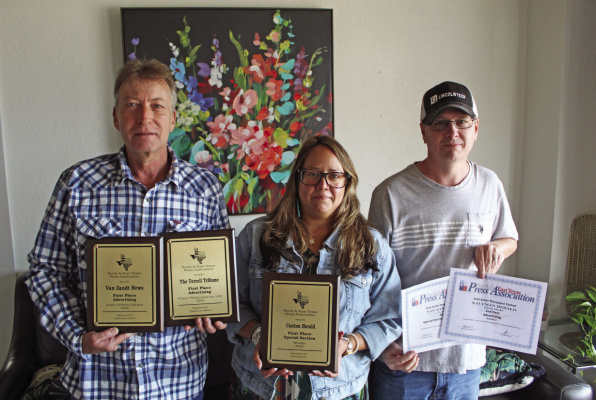 Van Zandt Newspapers L.L.C. recently received a number of awards at the 99th Annual North and East Texas Press Association (NETPA) Convention in Pilot Point. Shown with the awards were left to right, Van Zandt Newspapers L.L.C. staff members Tim Ball, Graphic Designer; Amanda Greene, Office Manager/Layout; and Brian Edwards, Operations Manager. Van Zandt Newspapers L.L.C. publishes the Van Zandt News, Canton Herald, The Terrell Tribune, and The Kaufman Herald. Photo by David Barber