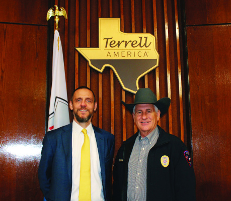 Terrell City Manager Mike Sims (left) alongside retiring Terrell Police Chief Ken McKeown as he announces his retirement after starting his career with Terrell PD in 1993. Photo courtesy of City of Terrell