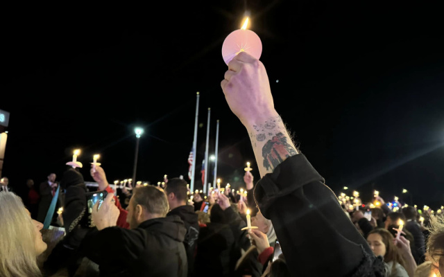 Candlelight vigil burns bright for Officer Candanoza