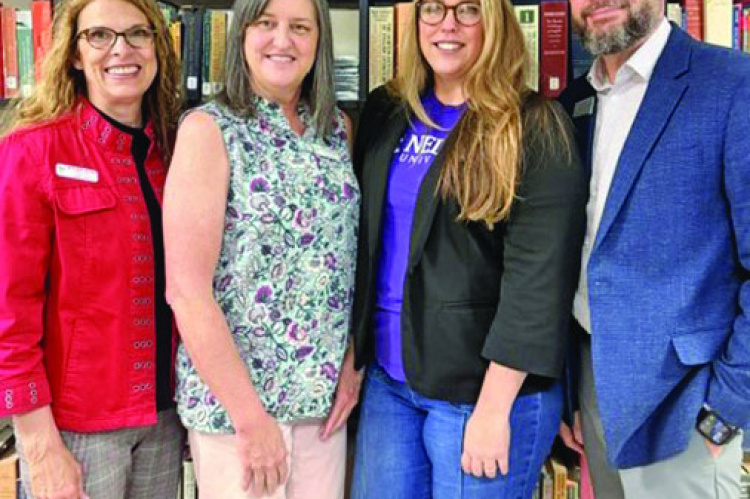 Dr. Anne Horan (from left) and Debbie Dominguez with Poetry Community Christian School and Heather Orrill and Dr. Hartman with Nelson University. Photo courtesy of PCCS
