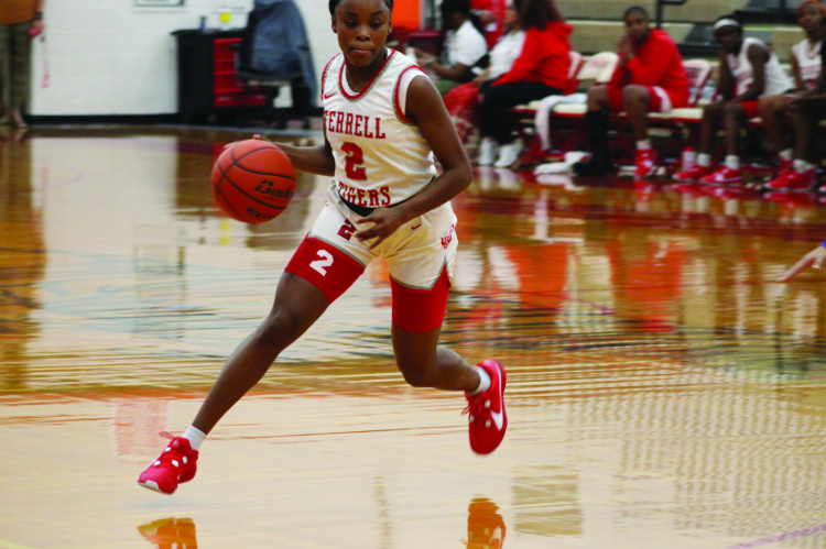 The Terrell Lady Tigers picked up their second win of the season with a 45-38 defeat of the North Mesquite Stallions Nov. 18 at Forney High School during tournament play. Photo by Bodey Cooper